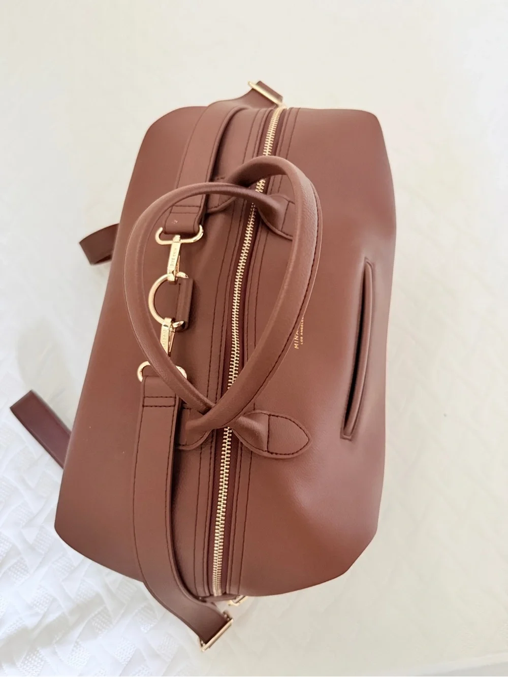 Mina Baie sleek brown